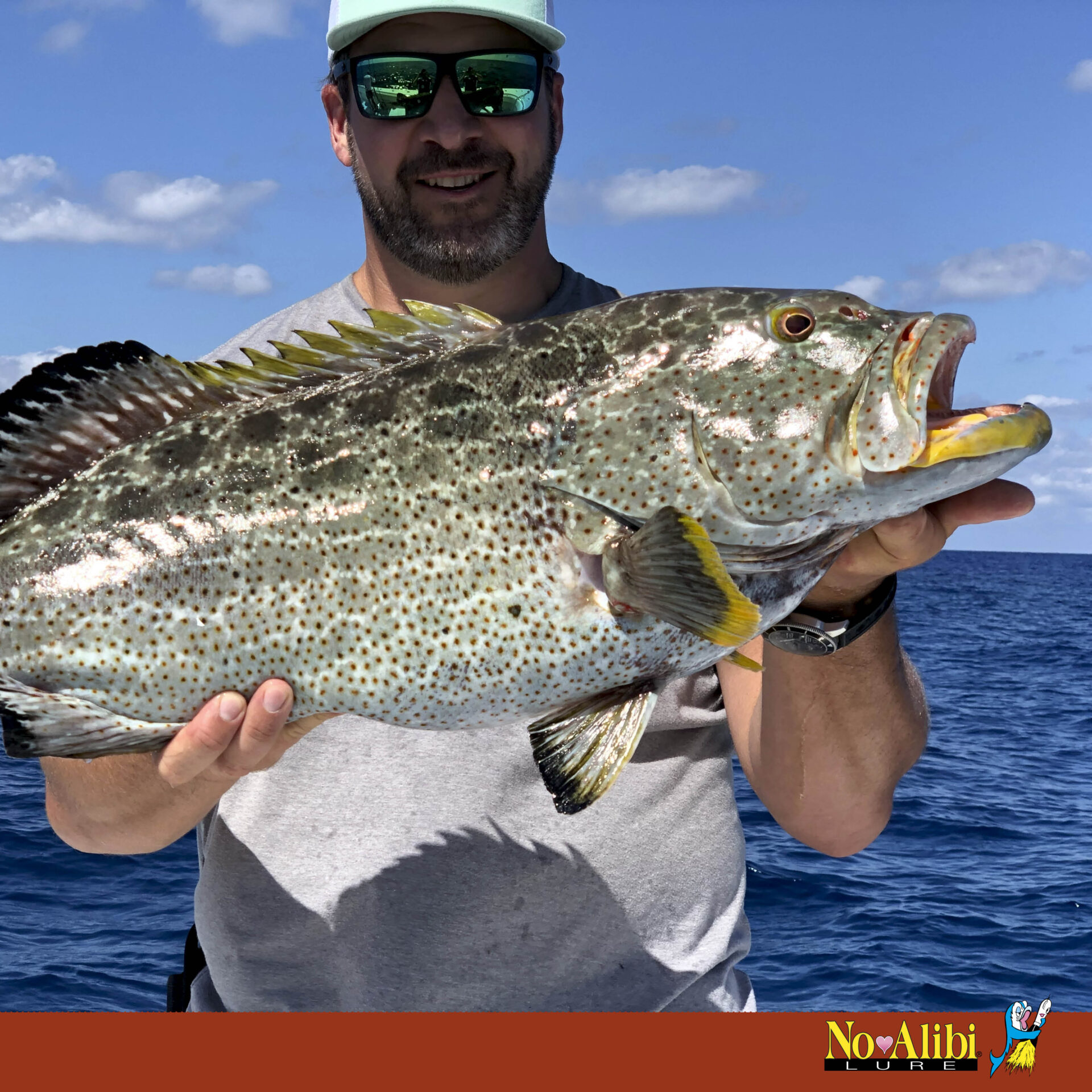 No Alibi, Alien Jig - Squid Head, 2.5 oz / 70.9 g, Pink/Blue Speckle Head, Pink/Clear/Blue Disco Skirt, Pink Squid Paws, 9/0 Hook, 8.5 in / 21.6 cm - Image 10